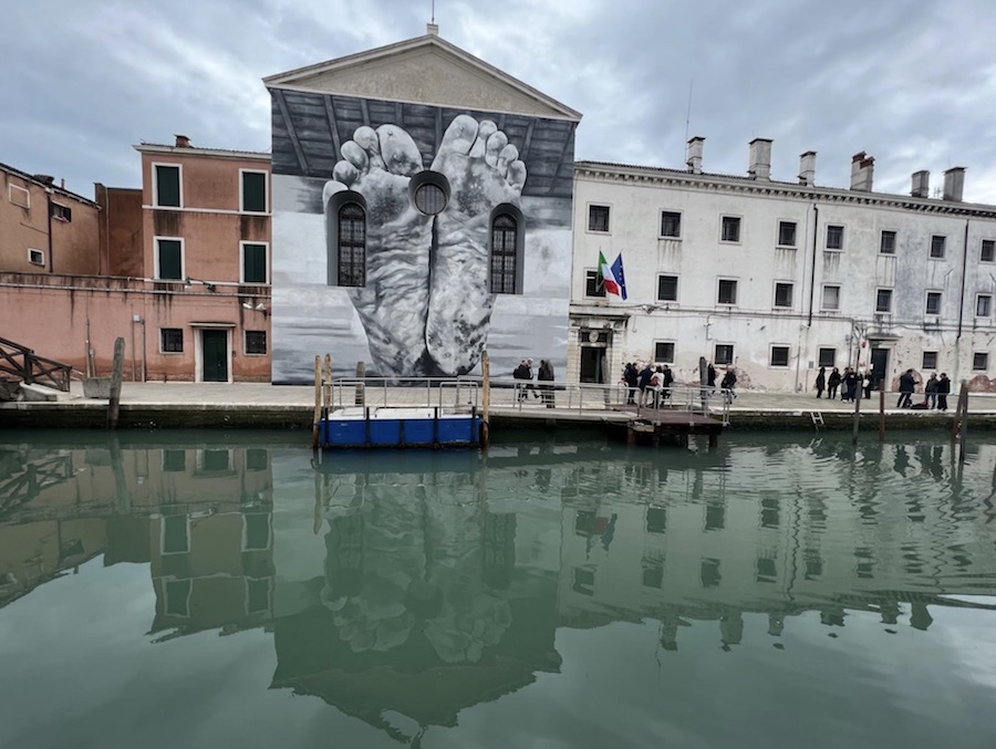 View of the Casa di Reclusione Femminile and the Pavilion of the Holy See, mural by Maurizio Cattelan