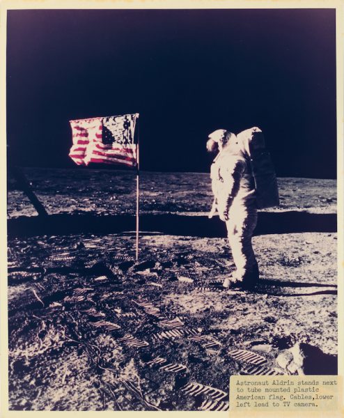 Neil Armstrong Surveys US Flag On Moon 