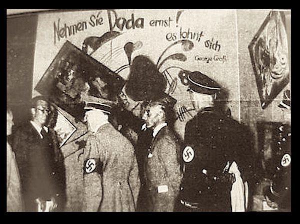 Hitler attending the ‘Entartete Kunst’ exhibition in 1937