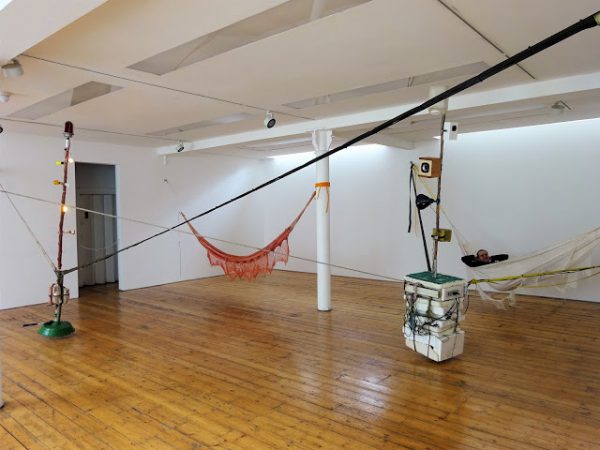 Installation view with hammock occupation