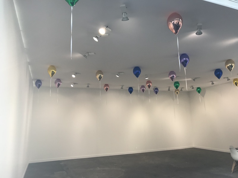 Jeppe Hein’s balloons glue on the ceiling at 303 Gallerie