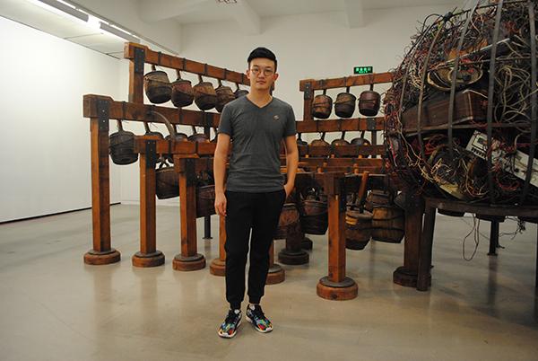 Senior Curator Li Qi