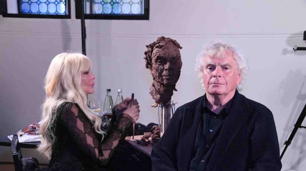 Frances Segelman sculpting Sir Simon Rattle