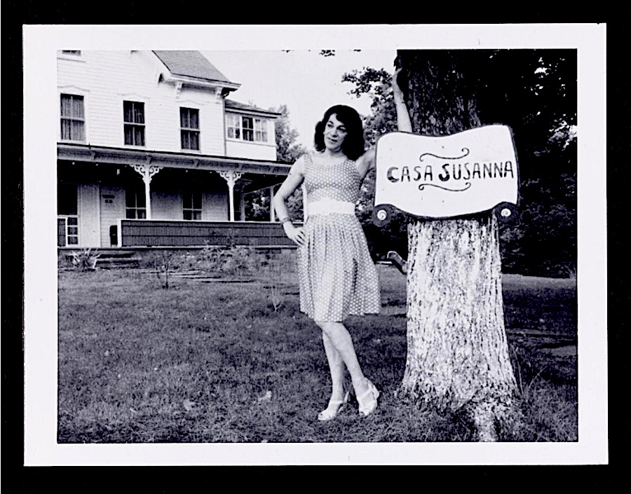 Attributed to Andrea Susan.Susanna by the Casa Susanna sign, gelatin silver print, Hunter, New York, 1964-1968. Collection Art Gallery of Ontario, Toronto. Purchase, with funds generously donated by Martha LA McCain, 2015. Photo © AGO.