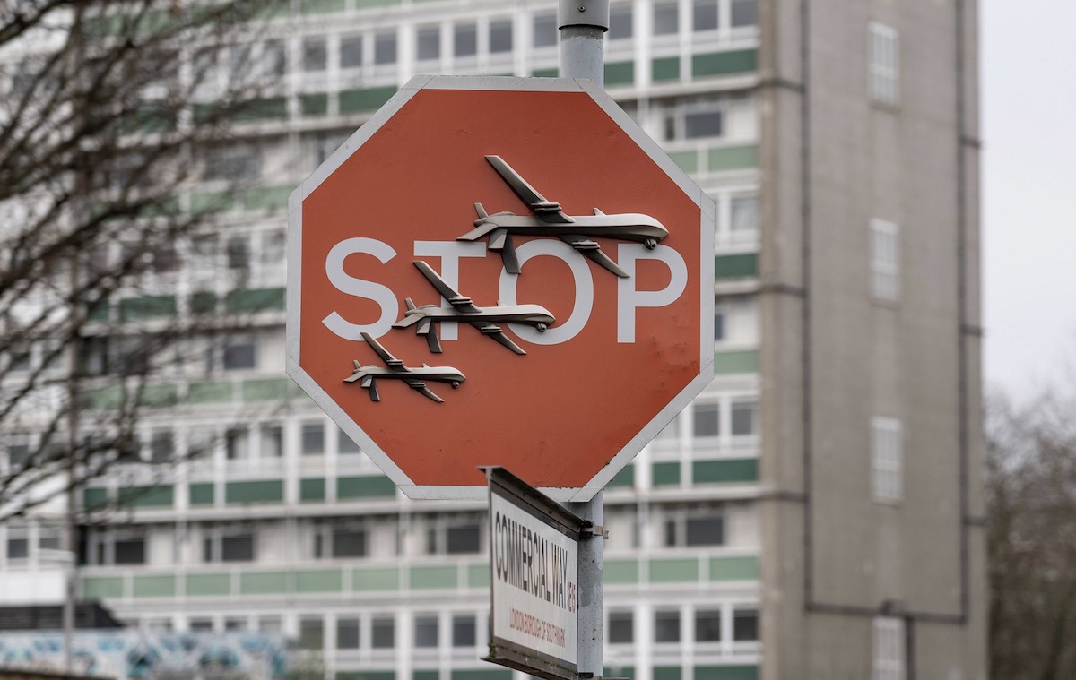 Banksy ,Stop Sign Theft, Probe Continues, Men Re-bailed, Met Police