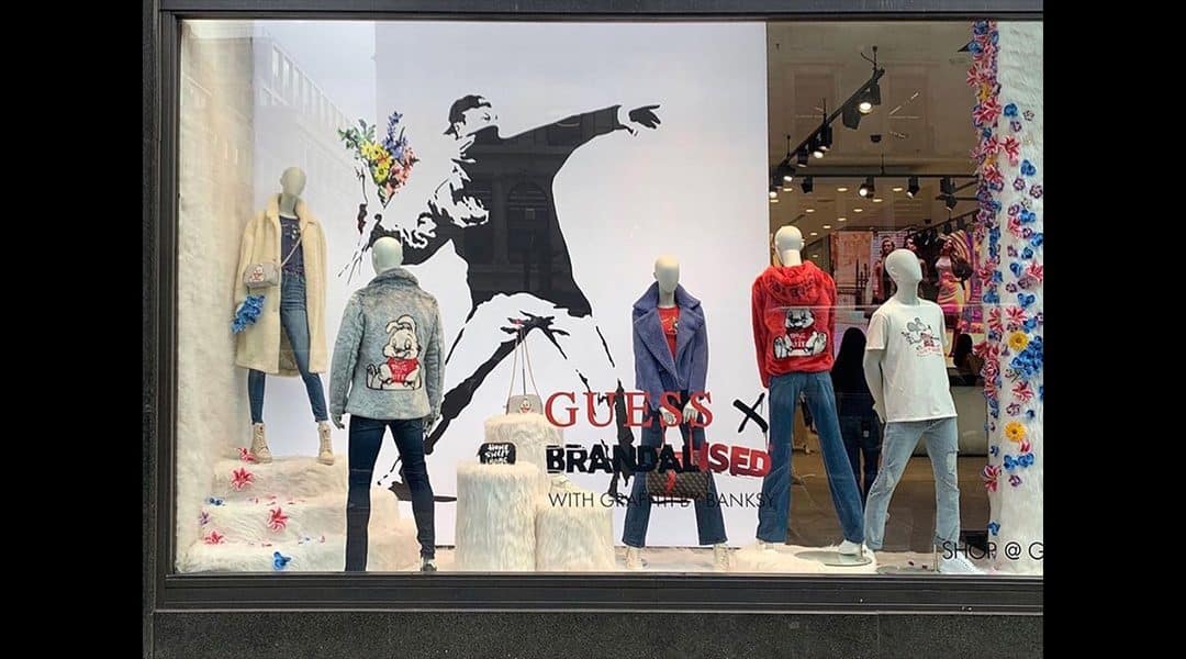 Banksy Slams Guess Brand For Appropriating Flower Thrower IP 