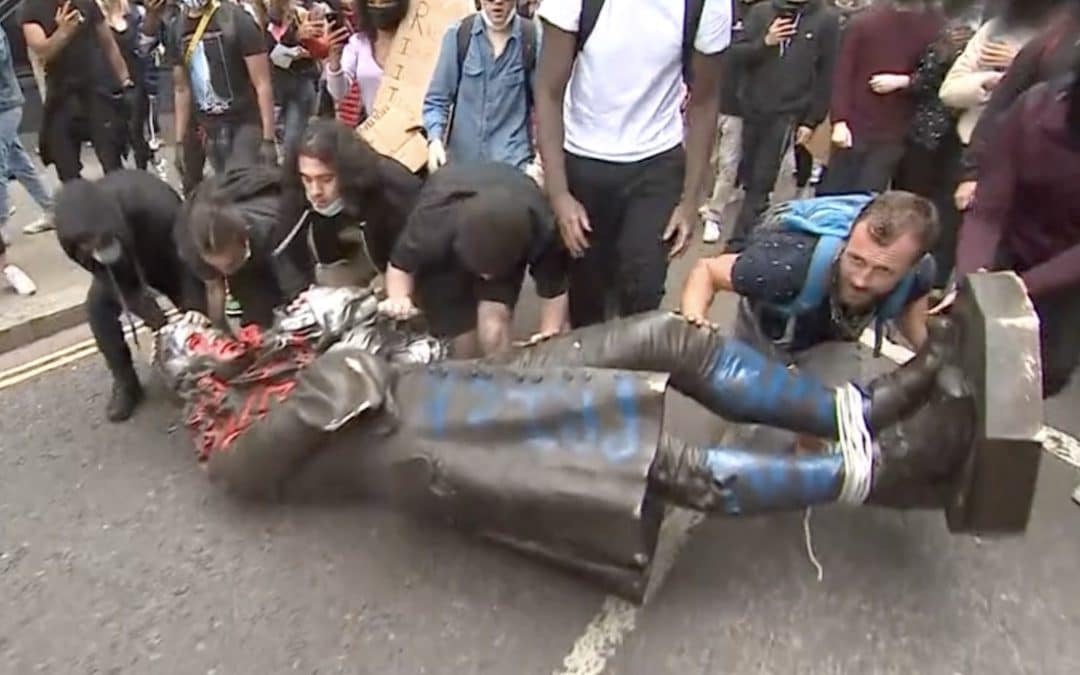 Protesters Tear Down Statue To Slave Trader In Bristol 