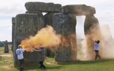 Just Stop Oil Activists Target Stonehenge with Orange Powder Paint