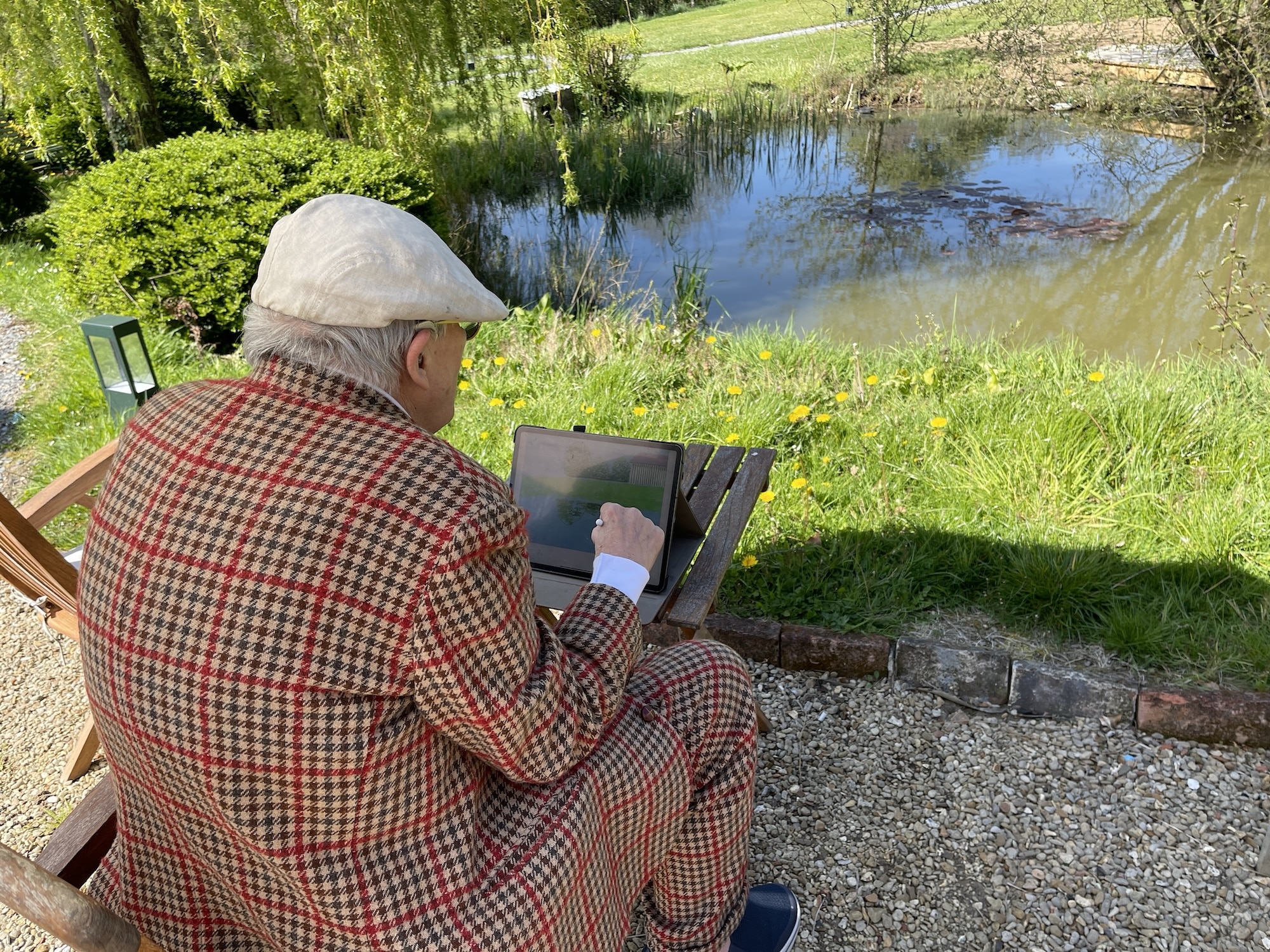 David Hockney working on iPad: David Hockney, Normandy, 2021 © David Hockney Photo Credit: Jonathan Wilkinson